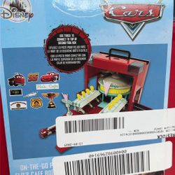 Disney Store Action Toys Pixar Car Play Set - Toolbox Case with Lightning McQueen & Red Die Cast Cars, Launcher, Flo's V8 Cafe, Gas Pumps & More