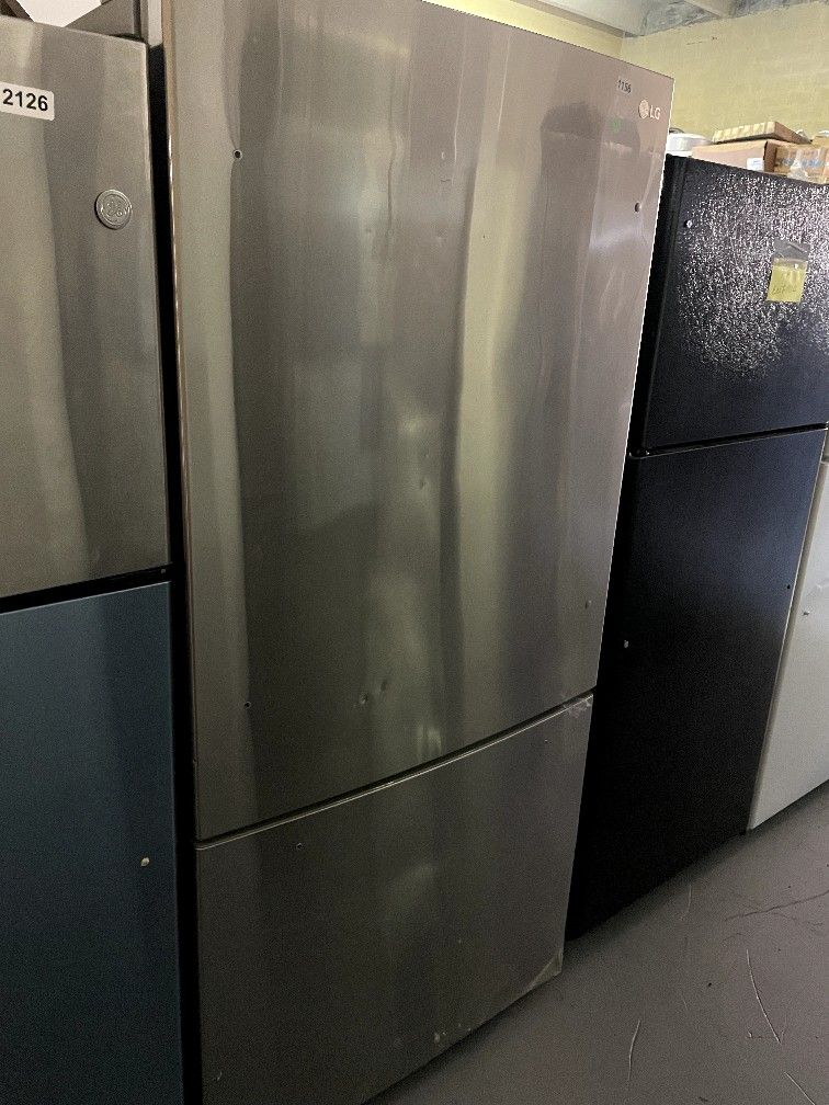 LG 33” Bottom freezer refrigerator NO HANDLES and DENTED $400