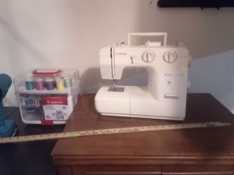Singer sewing machine nothing wrong machine cabinet and new sewing box