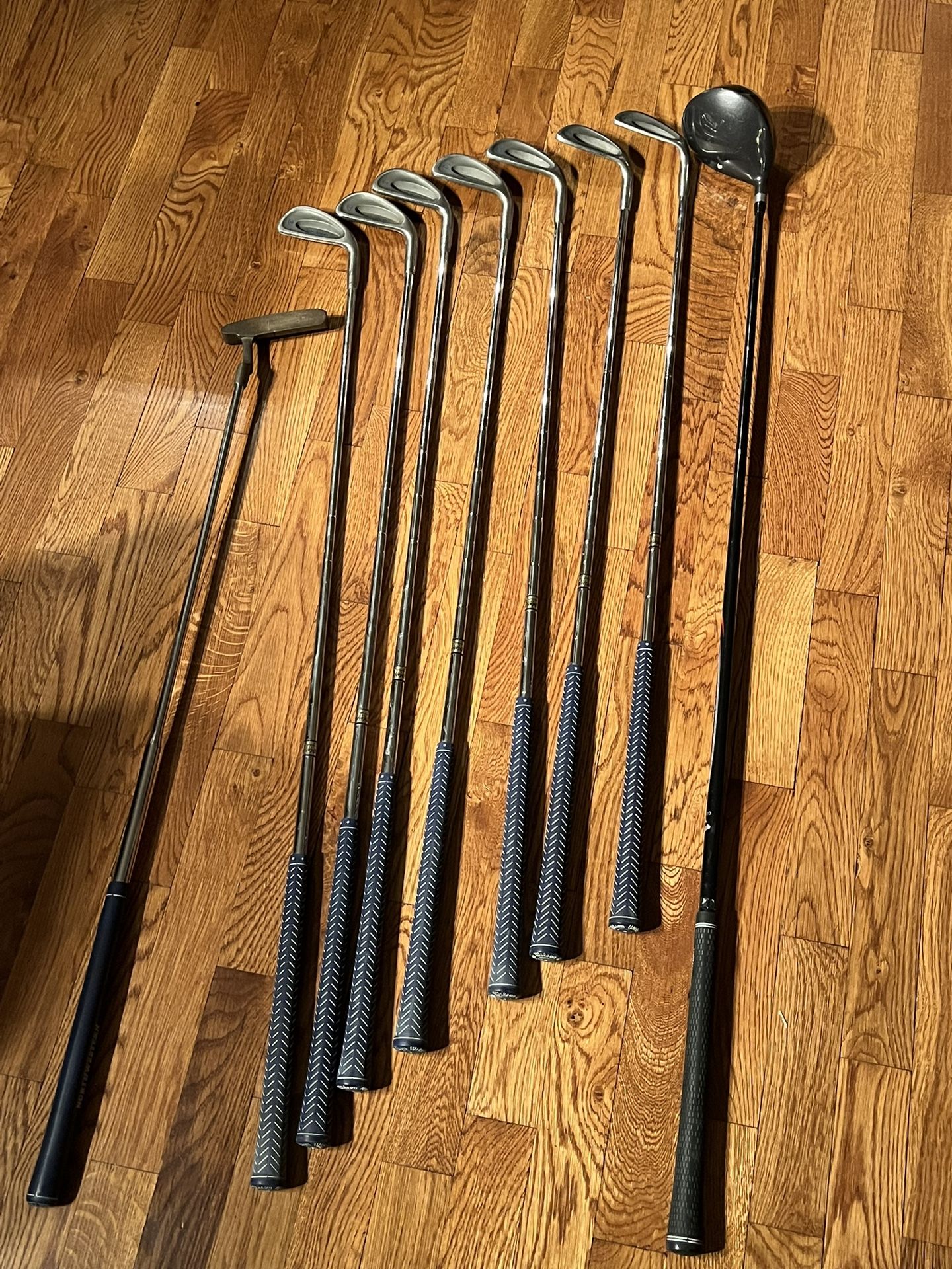 (9) Wilson Irons, Cougar Driver and Northwestern Putter Golf Clubs-Right handed clubs