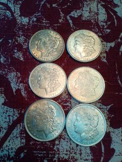 Miscellaneous silver Dollars trade for old pocket watches