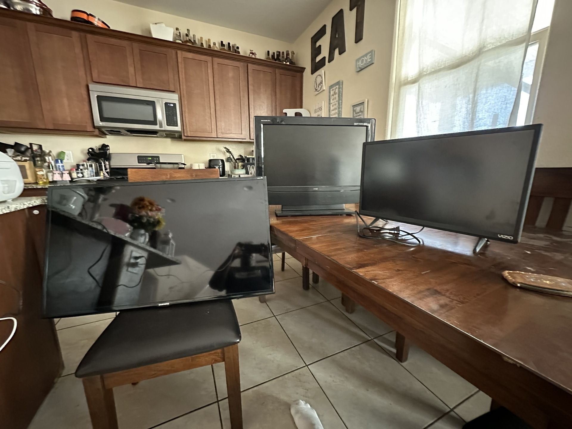 3 TV's $35. **THEY ARE NOT SMART TVS** BUT ARE GREAT TVs -32" VIZIO, 42" SAMSUNG AND 36" ENVISION