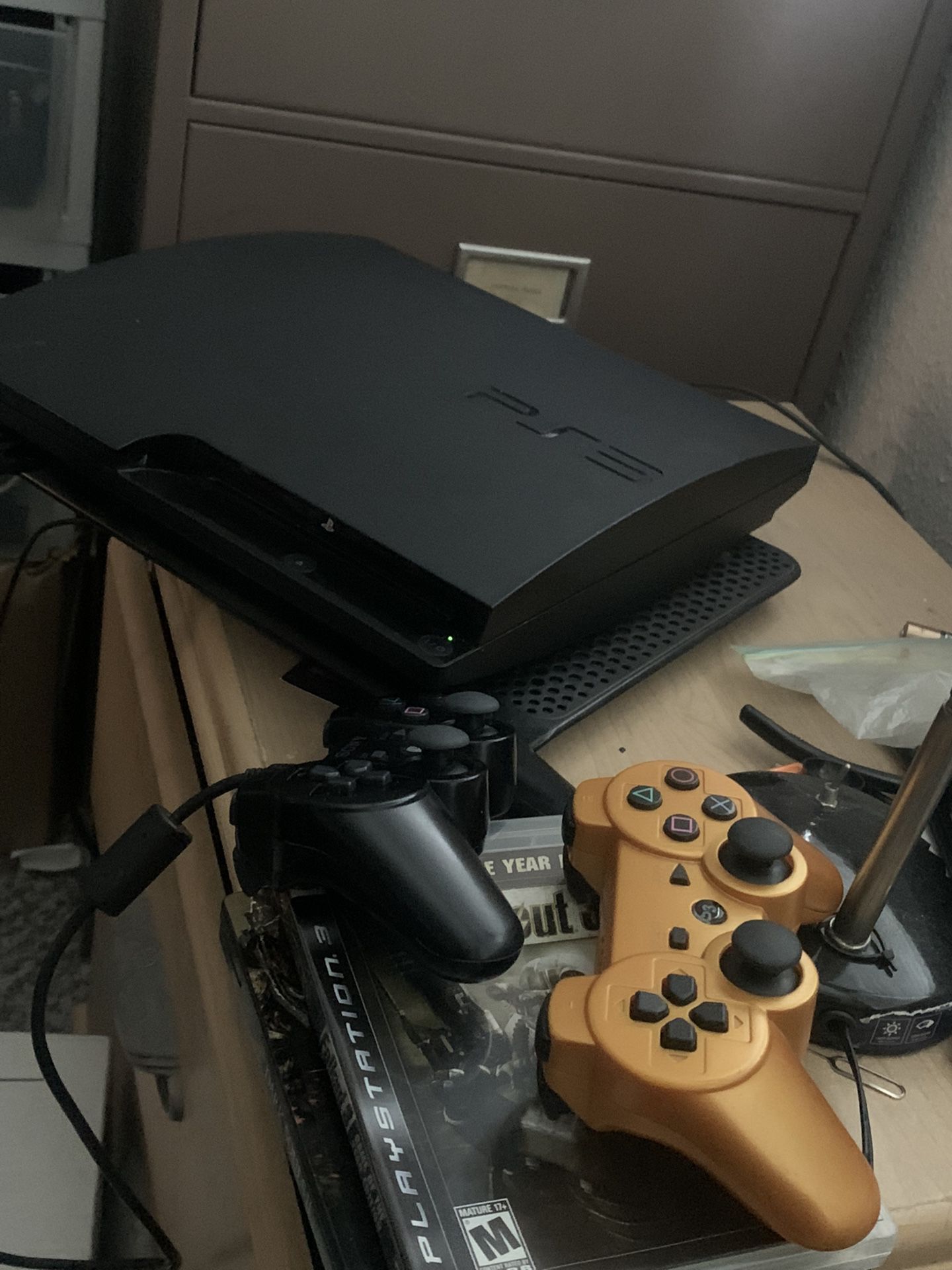 PS3 Slim With 3 Controllers &4 Games 