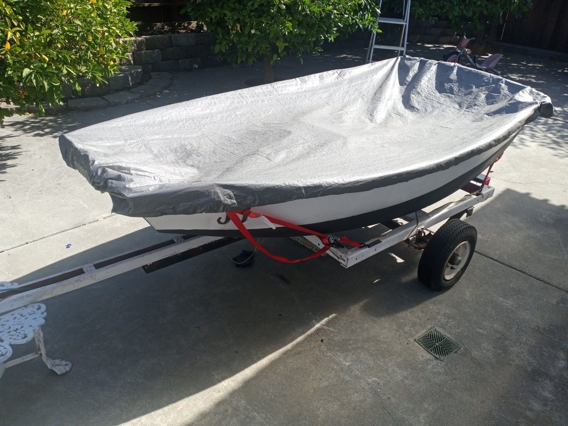 6ft.mini fishing boat..with trolling motor,battery,boat cover and trailer