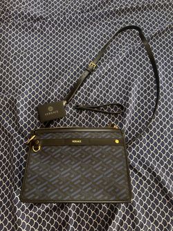 Slightly used Versace side bag.