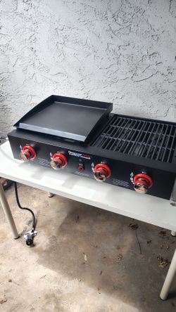 Brand new never used assembled Royal Gourmet 4-Burner Portable Propane Gas Grill & Griddle Combo plus full propane tank. $220 firm no offers.