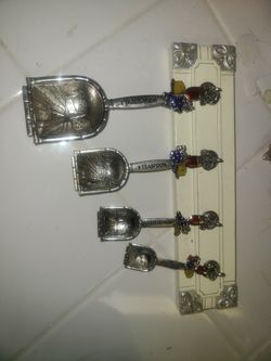 Wine themed measuring spoons and wall holder