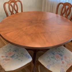 46” Hardwood Table With 2 18” Leafs And 4  Chairs