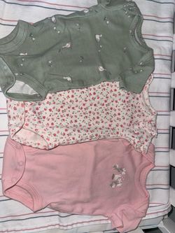 Newborn onesies, carters