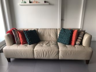 Leather couch + Ottoman