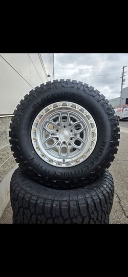17" ARENA rims w/ 33" RT tires