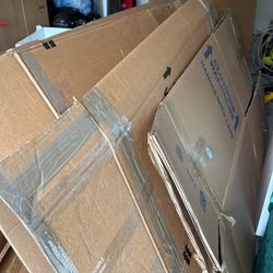 Free Moving Boxes And Bags Filled With Moving Paper 