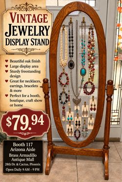 Vintage Oak Jewelry Display Stand β $79.94 Beautiful tall oval solid-wood-look jewelry display with wire mesh center and freestanding swivel-style fr