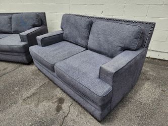 Two Gray Upholstered Loveseats w/ Nailhead Trim