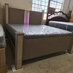 New king size bed frame with used king size mattress and box spring 🚚 we can deliver 🚚  $39 down payment for financing  Total price $949