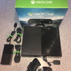 Xbox One black with games