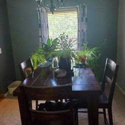 Dining room table with four chairs