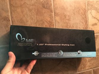 Flat iron. $50 new in box