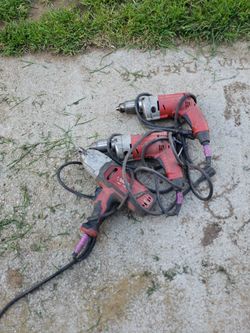 2 Milwaukee Half Inch Drills And One Three Quarter Inch Electric Impact
