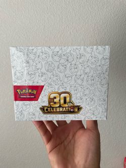 Pokémon TCG 30th Celebration Min Tin Display