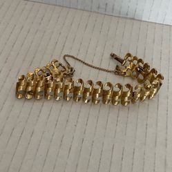 Vintage Monet Gold Tone Swirled Segmented Bracelet With Safety Clasp 7.25"