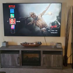 82" LG TV Wth 75" wide Entertainment Stand with Electric Fire Place 