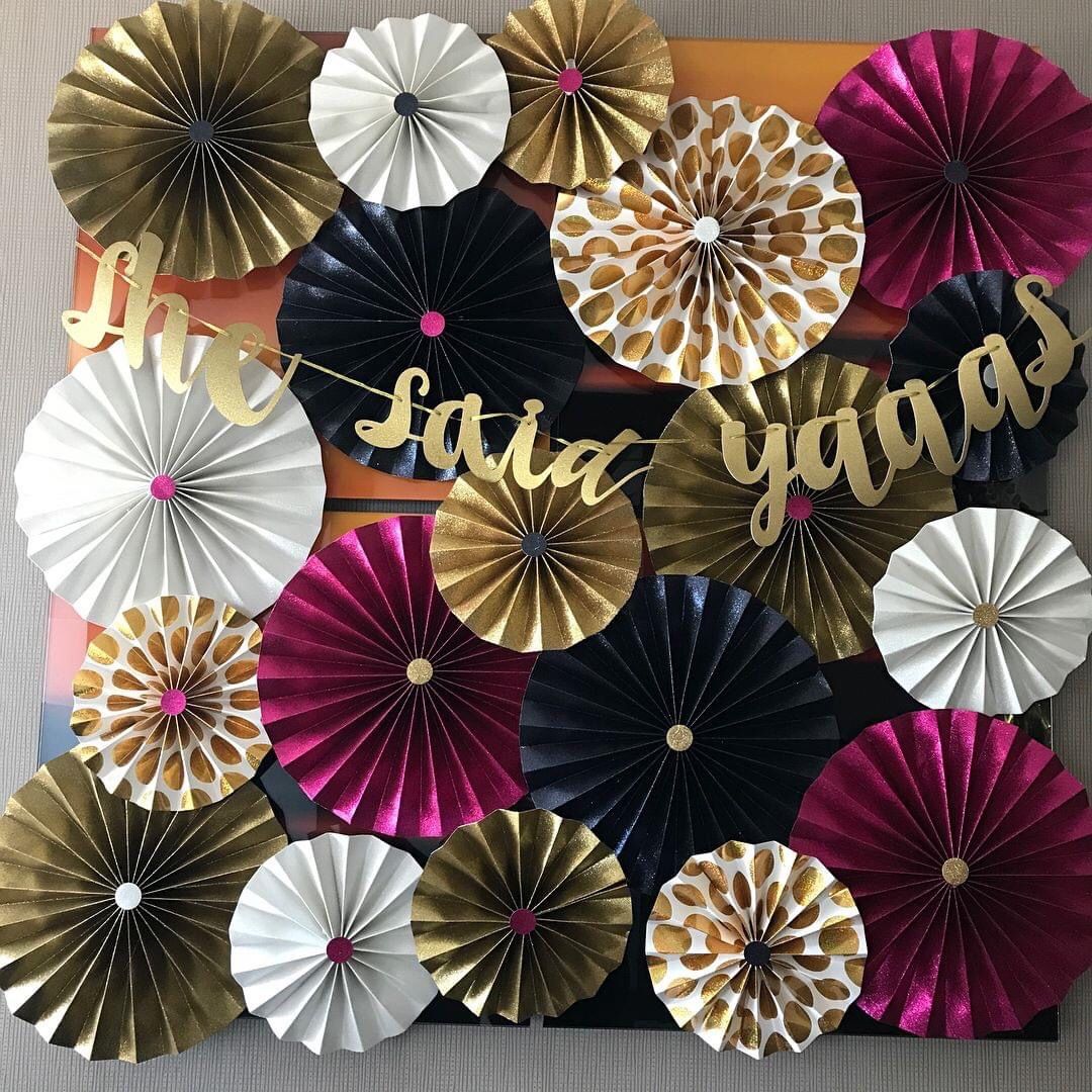 Pink, gold, black & white rosettes & gold banner!