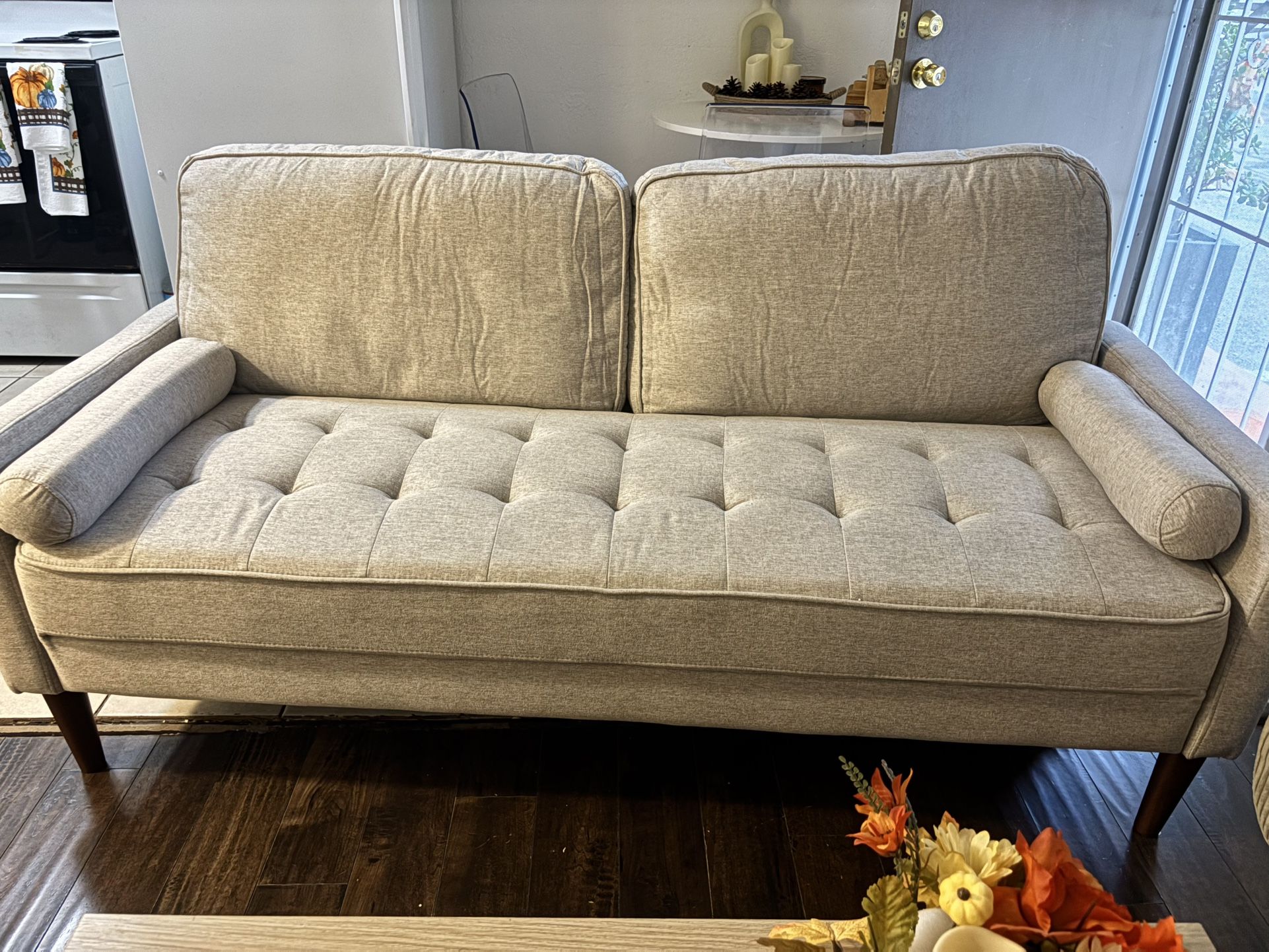 “Modern light gray sofa - new, recently assembled. Very comfortable.”