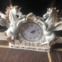 Clock with horses