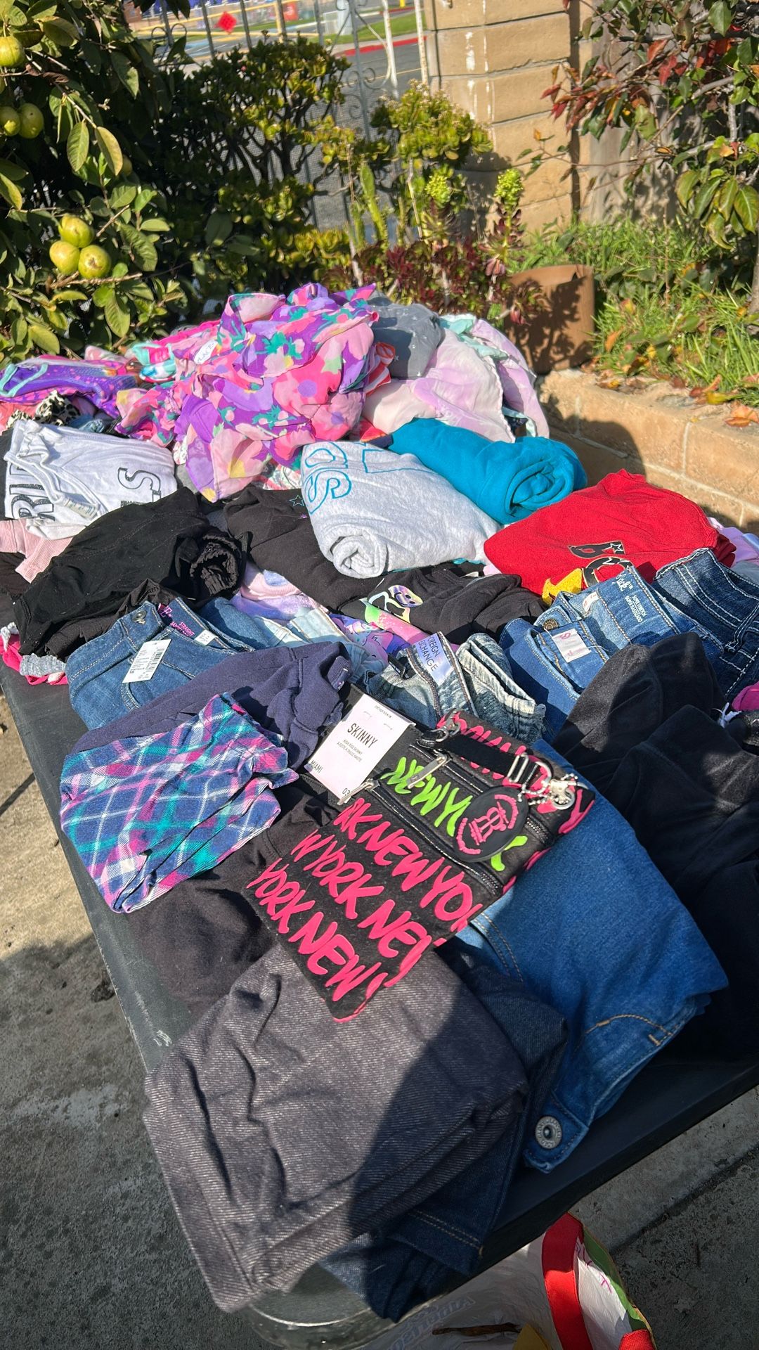 Children Clothes Adult Clothes Glass Tank And Twin Size Bed