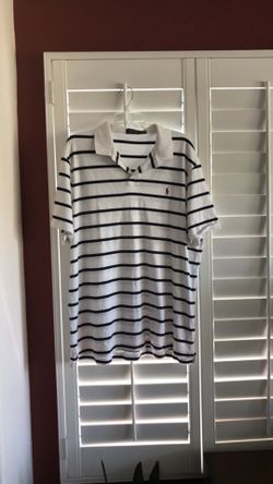 Pre owned polo Ralph shirt size XXL, wear and wash one time, still quite new and pre shirked color while and navy blue