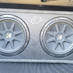 "Upgrade Your Car's Audio System: Two 12" Kickers with Amp for Sale!"
