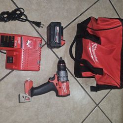 Milwaukee  Hammer Drill And 5.0 Battery And Charger 