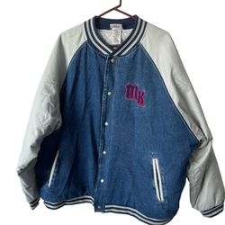 Vintage Disney World varsity denim jacket, from the late 90s or early 00s. Thick construction with a warm quilted lining, embroidered graphics, and cu