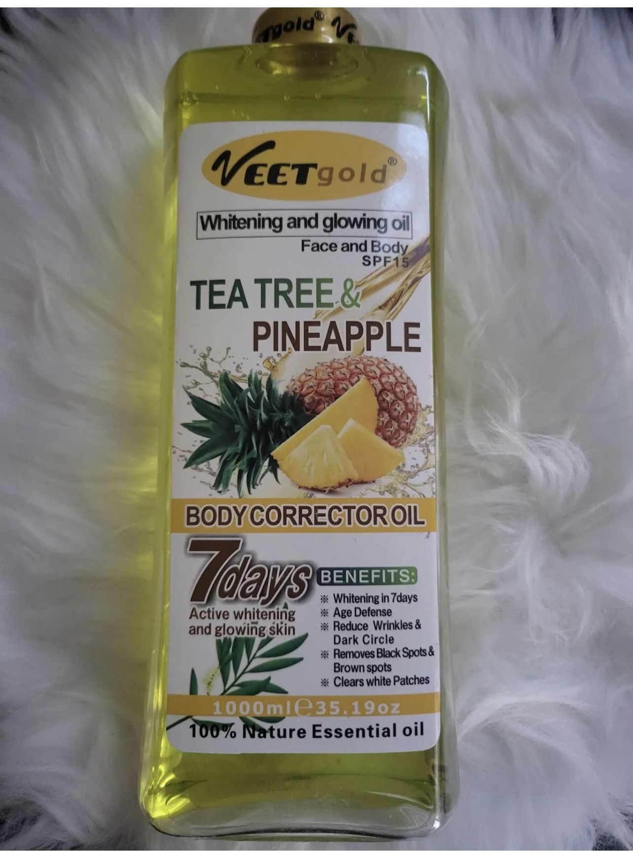 veet gold tea tree & pineapple body whitening glowing body corrector oil.spf15