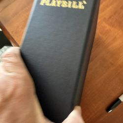 Playbill Holder Filled With Playbills 