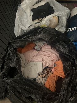 Bag Of Clothes And Shoes