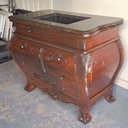 lavabo gabinete 100% madera de cerezo con top de granito excelentes condiciones 46"WIDE X 37"HIGH X  24"DEEP 