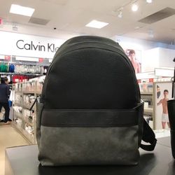 Brand new with tag Calvin Klein men black/gray man made durable faux leather classic backpack  Size 11x7x18 inches