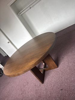 Mid-century modern round wood dining table