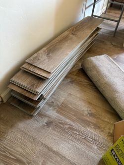 Free leftover laminated flooring and baseboard
