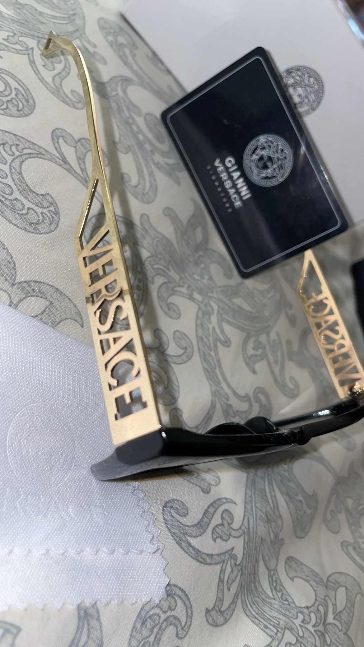 Used pair of versace sunglasses