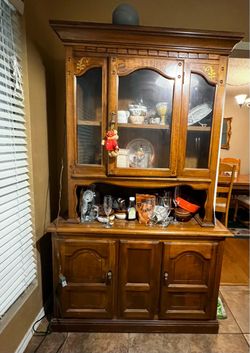 Mid-century modern wooden China cabinet with glass doors and cabinets beneath, 77 inches high Mid-century modern wooden China cabinet with glass doors