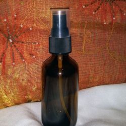 2 oz (60ml) Boston Round Amber Glass Bottle with Fine Mist Spray Pump