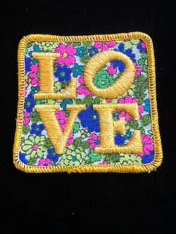 VTG Hippie Era LOVE" embroidered patch with flower power background.Iron/ Sew on.