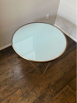 Glass top coffee table