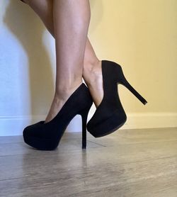 Black high heels worn twice years ago