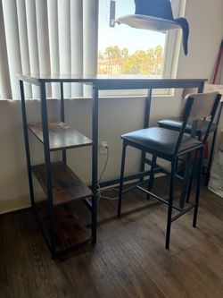 Brown and Black Metal Bar-Height Kitchen Table