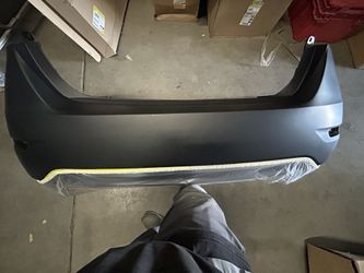 Rear bumper for a Nissan Sentra