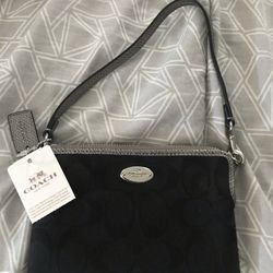 Coach Wristlet NWT  Black and silver  